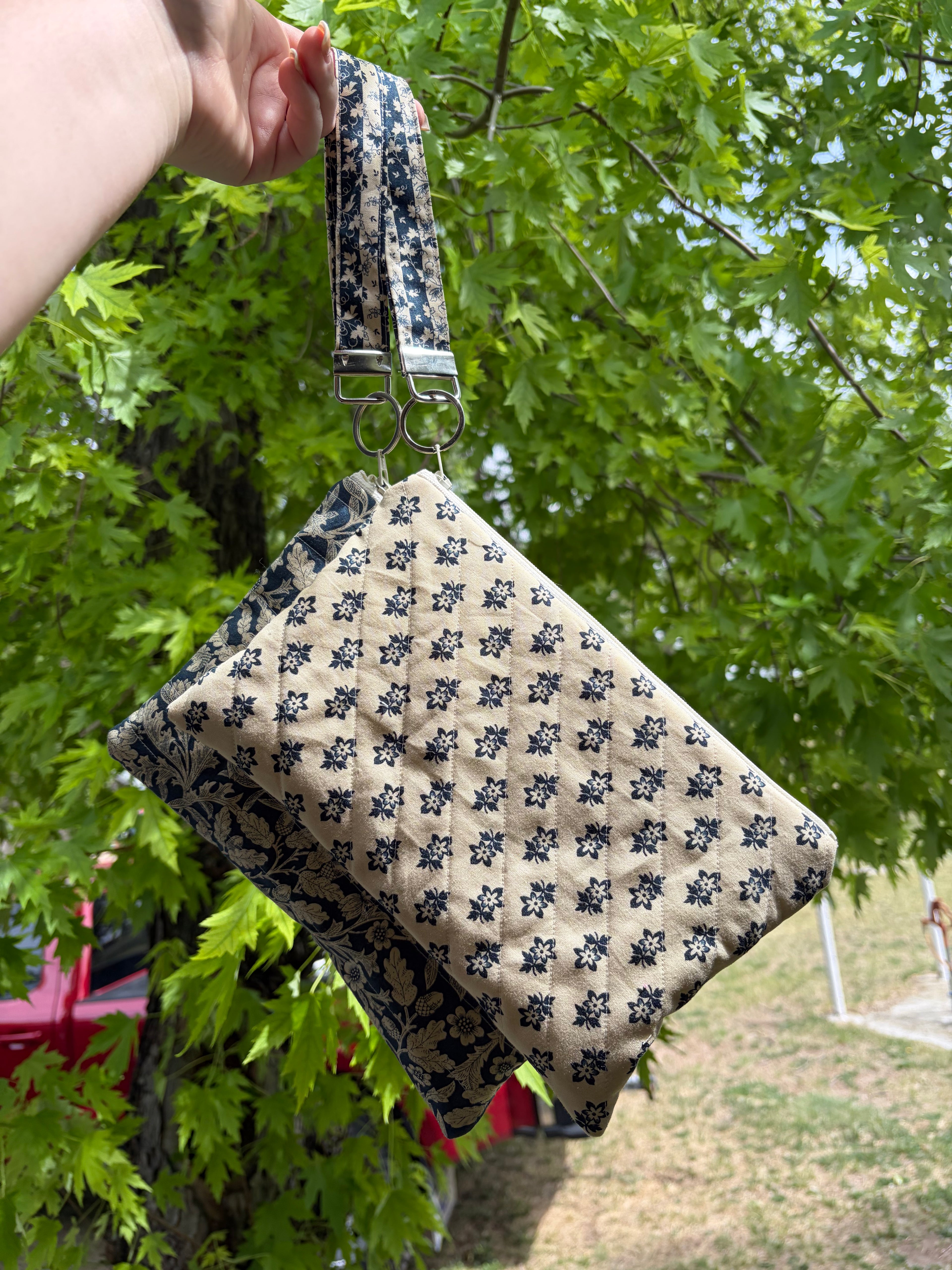 Zipper pouch with wristlet