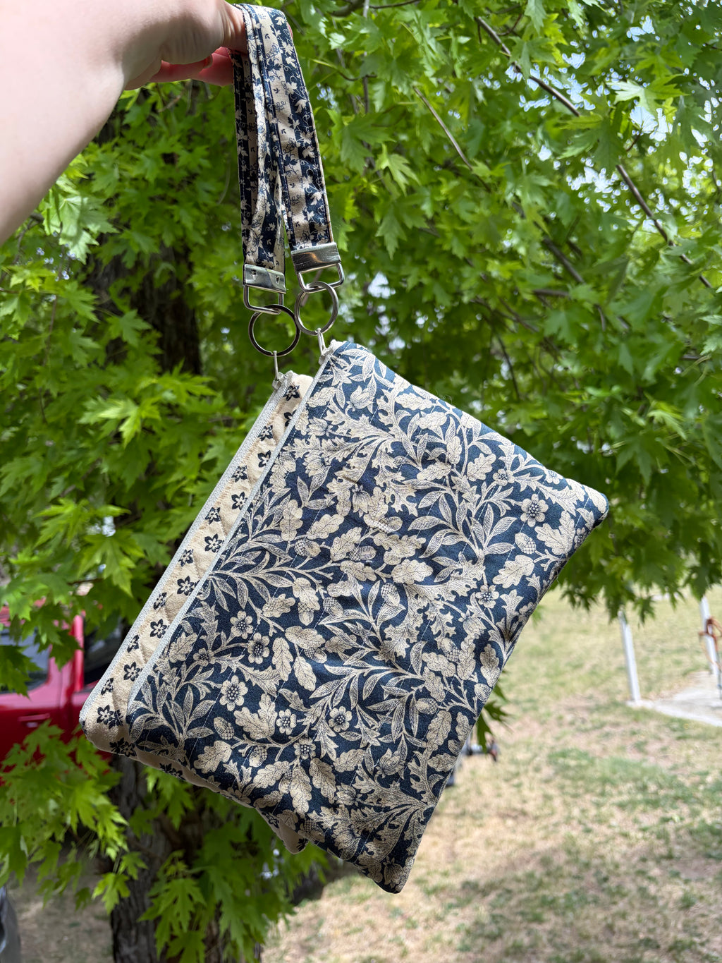 Zipper pouch with wristlet